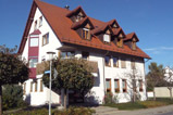 Mehrfamilienhaus mit Erker